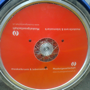 Velo Radscheibe mit Logo von Muskelgesellschaft