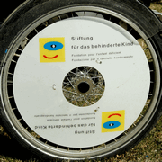 Velo Radscheibe mit Logo von der Stiftung für das behinderte Kind